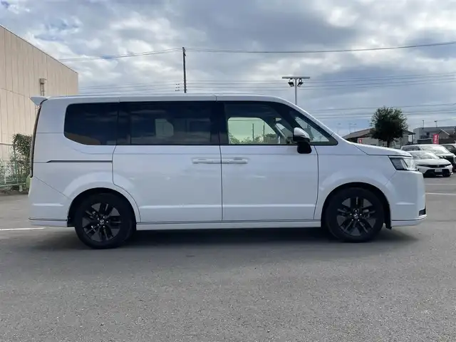 ホンダ ステップワゴン スパーダ 東京都 2024(令6)年 1.2万km プラチナホワイトパール Ｇａｔｈｅｒｓ純正８型ナビ　フルセグＴＶ　ＣＤ／ＤＶＤ　バックカメラ　追従クルーズ　ＢＳＭ　シートヒーター　両側パワースライドドア　電動リアゲート　ＥＴＣ　ドライブレコーダー　衝突被害軽減ブレーキ