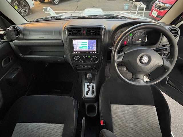 スズキ ジムニー ワイルドウィンド 宮城県 2007(平19)年 15.1万km パールホワイト 登録時走行距離150247km/パワーステアリング/パワーウインド/スペアキー有り/ACエアコン/Bluetooth接続/TV/AM/FM/SD/AUX/HIDヘッドライト/４WD/オフロードマッドタイヤ(ヨコハマ　ジオランダーG003)22年製/ヘッドライトレベライザー/純正フロアマット/純正アルミホイール/ABS/車高調リフトアップ/ルーフレールキャリア付き