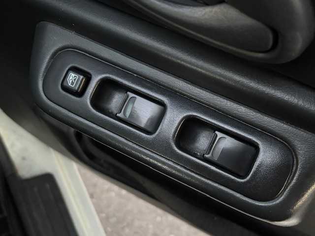 スズキ ジムニー ワイルドウィンド 宮城県 2007(平19)年 15.1万km パールホワイト 登録時走行距離150247km/パワーステアリング/パワーウインド/スペアキー有り/ACエアコン/Bluetooth接続/TV/AM/FM/SD/AUX/HIDヘッドライト/４WD/オフロードマッドタイヤ(ヨコハマ　ジオランダーG003)22年製/ヘッドライトレベライザー/純正フロアマット/純正アルミホイール/ABS/車高調リフトアップ/ルーフレールキャリア付き