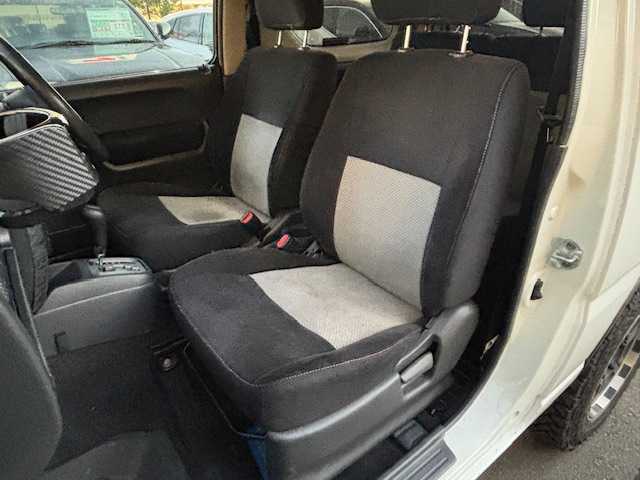 スズキ ジムニー ワイルドウィンド 宮城県 2007(平19)年 15.1万km パールホワイト 登録時走行距離150247km/パワーステアリング/パワーウインド/スペアキー有り/ACエアコン/Bluetooth接続/TV/AM/FM/SD/AUX/HIDヘッドライト/４WD/オフロードマッドタイヤ(ヨコハマ　ジオランダーG003)22年製/ヘッドライトレベライザー/純正フロアマット/純正アルミホイール/ABS/車高調リフトアップ/ルーフレールキャリア付き