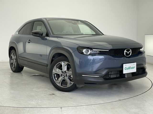 マツダ ＭＸ－３０ モダンコンフィデンス 千葉県 2023(令5)年 2.3万km ポリメタルグレーM 純正ナビ/・FM/AM BT USB HDMI SD フルセグTV/追従型クルーズコントロール/スマート・ブレーキ・サポート/車線維持機能/運転席メモリーシート/タッチパネル式フルオートエアコン/プッシュスタート/電動パーキングブレーキ/オートブレーキホールド/オートライト/雨滴感知オートワイパー/ETC/運転席パワーシート/パドルシフト/フレームレスルームミラー/純正フロアゴムマット/後席観音開きドア