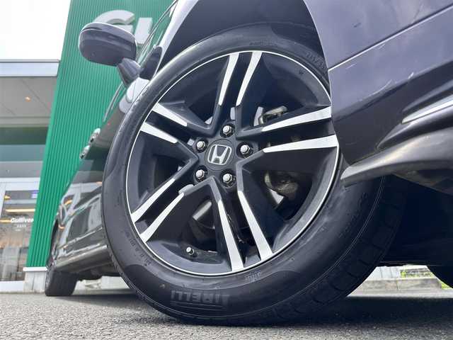 ホンダ オデッセイ ハイブリッド アブソルートセンシングEXパック 宮城県 2016(平28)年 5.7万km プレミアムヴィーナスブラックP Hondaインターナビ＋リンクアップフリー/＋ETC車載器（ナビ連動）/マルチビューカメラシステム/＋スマートパーキングアシストシステム/＝＝＝/ホンダセンシング/●衝突軽減ブレーキ 〈CMBS〉/●歩行者事故低減ステアリング/●ACC 〈アダプティブ・クルーズ・コントロール〉/●LKAS 〈車線維持支援システム〉/●路外逸脱抑制機能/●誤発進抑制機能/●先行車発進お知らせ機能/●標識認識機能/純正ナビ/【CD・DVD・SD・BT・HDMI・フルセグTV】/社外フリップダウンモニター/純正ドライブレコーダー/ETC/AC電源1500W/両側パワースライドドア/ハーフレザーシート/パワーシート/革巻きステアリング/ステアリングスイッチ/オートライト/LEDヘッドライト/フォグライト/ウィンカーミラー/スマートキーX２