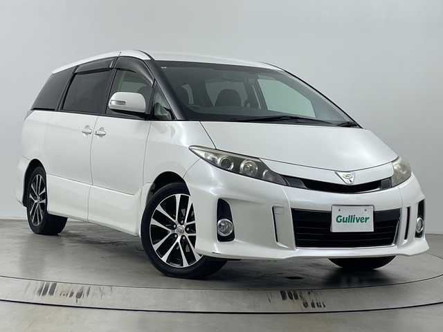 トヨタ エスティマ アエラス 埼玉県 2012(平24)年 6.9万km ホワイトパールクリスタルシャイン 純正フリップダウンモニター/純正ナビ/　(Bluetooth/CD/DVD/DS/FM/AM)/フルセグテレビ/バックカメラ/ビルトインETC/前方ドライブレコーダー/両側パワースライドドア/クルーズコントロール/プッシュスタート/オートキセノンライト/純正フロアマット/純正18インチアルミホイール