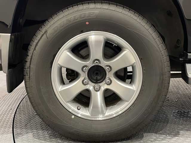 トヨタ ランドクルーザー プラド TX－LTD 60thスペシャル 新潟県 2006(平18)年 13.7万km ブラック パワーステアリング/パワーウィンドウ/４WD/オートエアコン/M/Dチェンジャー/バックカメラ/純正ETC/TV（ワンセグ）/HDDメモリナビ/3列シート/純正フロアマット/布シート/ルーフレール/純正アルミホイール/ABS/オートライト/Wエアバック