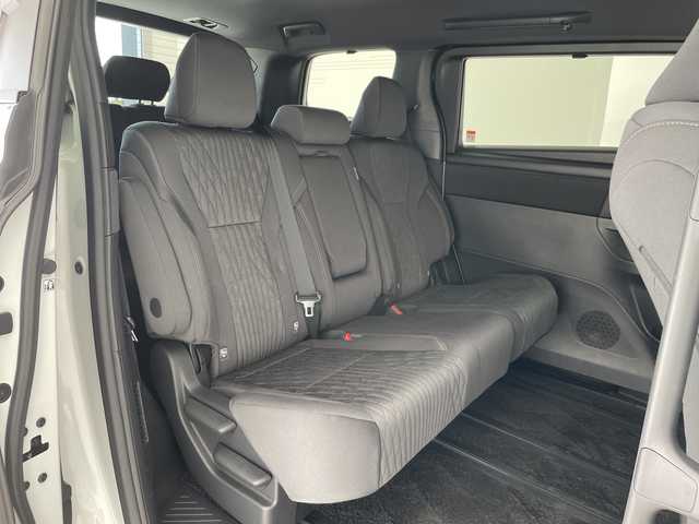 トヨタ アルファードハイブリット X 愛知県 2025(令7)年 0.5万km プラチナホワイトパールマイカ 純正9型ディスプレイオーディオ　ナビ機能なし/フリップダウンモニター/全方位カメラ/三眼LEDヘッドライト/両側パワースライドドア/レーダークルーズコントロール/バックカメラ/コーナーセンサー/純正アルミホイール/ETC2.0/ブラインドスポットモニター/リアオートエアコン/オートマチックハイビーム/衝突軽減システム/フルセグ/Bluetooth/ステアリングスイッチ/スマートキー/プッシュスタート