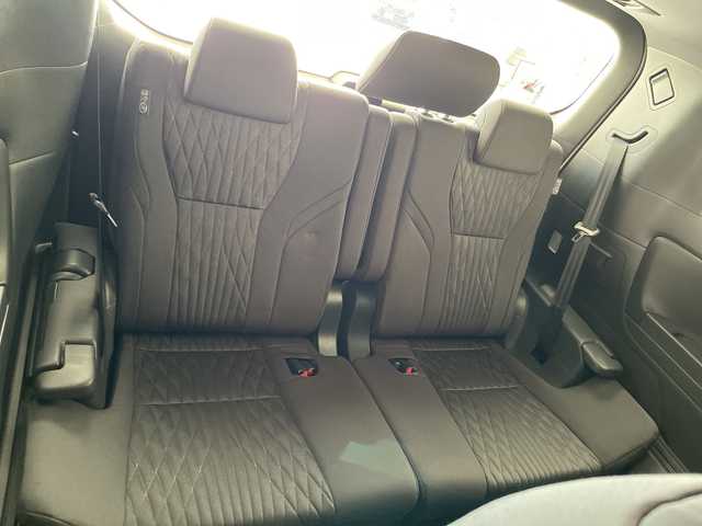 トヨタ アルファードハイブリット X 愛知県 2025(令7)年 0.5万km プラチナホワイトパールマイカ 純正9型ディスプレイオーディオ　ナビ機能なし/フリップダウンモニター/全方位カメラ/三眼LEDヘッドライト/両側パワースライドドア/レーダークルーズコントロール/バックカメラ/コーナーセンサー/純正アルミホイール/ETC2.0/ブラインドスポットモニター/リアオートエアコン/オートマチックハイビーム/衝突軽減システム/フルセグ/Bluetooth/ステアリングスイッチ/スマートキー/プッシュスタート