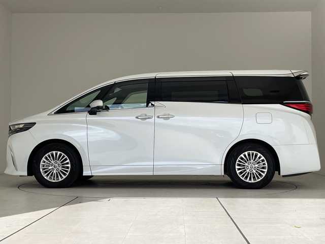 トヨタ アルファードハイブリット X 愛知県 2025(令7)年 0.5万km プラチナホワイトパールマイカ 純正9型ディスプレイオーディオ　ナビ機能なし/フリップダウンモニター/全方位カメラ/三眼LEDヘッドライト/両側パワースライドドア/レーダークルーズコントロール/バックカメラ/コーナーセンサー/純正アルミホイール/ETC2.0/ブラインドスポットモニター/リアオートエアコン/オートマチックハイビーム/衝突軽減システム/フルセグ/Bluetooth/ステアリングスイッチ/スマートキー/プッシュスタート