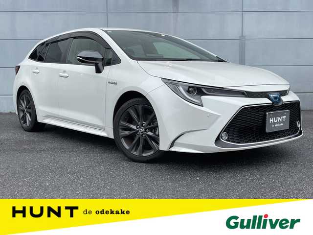 トヨタ カローラツーリング ハイブリッド ダブルバイビー 千葉県 2019(令1)年 3.1万km ホワイトパールクリスタルシャイン 9インチ純正ナビ/バックカメラ/クルーズコントロール/ＥＴＣ/ＵＳＢソケット/前席シートヒーター/オートライト/オートハイビーム/コーナーセンサー/衝突被害軽減ブレーキ/レーンキープアシスト/ステアリングヒーター/ＢＳＭ