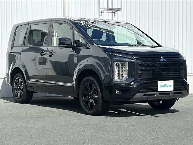 三菱 デリカＤ：５ シャモニー 三重県 2025(令7)年 0.1千km グラファイトグレーメタリック/ブラックマイカ 登録済未使用車 /ALPINE11型ナビ /全周囲カメラ /BSM /AC100V充電 /USB給電ポート/スペアキー /ステアリングヒーター/革巻きステアリング/ステアリングスイッチ /前席シートヒーター /運転席パワーシート /パワーバックドア /両側パワースライドドア/レーダークルーズコントロール/レーンキープアシスト/衝突軽減ブレーキ/パドルシフト/ハーフレザーシート/LEDヘッドライト/オートハイビーム /オートライト/電動格納ミラー/禁煙車