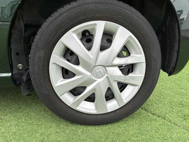 ホンダ Ｎ ＢＯＸ G L ホンダセンシング 香川県 2020(令2)年 3.4万km ブリティッシュグリーンP 登録時走行距離：34052ｋｍ/衝突被害軽減装置/純正SDナビゲーション/→フルセグTV/→CD/DVD再生/バックカメラ/ビルトインETC/シートヒーター/左側パワースライドドア/ステアリングリモコン/アダプティブクルーズコントロール/横滑り防止装置/レーンキープアシスト/スマートキー