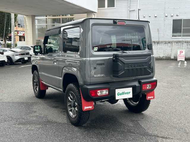 スズキ ジムニー XC 宮城県 2020(令2)年 2.4万km ミディアムグレー 4WD/4WD切り替えスイッチ/JAOS40mmアップキット（純正あり）/スイスポ用リアフォブスイッチ（純正あり）/CLLINK背面ボックス/純正ナビ/FM/AM/i Pod/USB/BT/CD/DVD/フルセグTV/バックカメラ/ステアリングスイッチ/前席シートヒーター/社外デジタルインナーミラー/純正アルミ冬タイヤ16インチ/積み込み社外アルミ夏タイヤ/クルーズコントロール/横滑り防止装置/衝突被害軽減システム/ダウンヒルアシストコントロール/レーンキープアシスト/盗難防止装置/社外フロアマット/ウィンカードアミラー/電動格納ミラー/社外前後ドライブレコーダー/LEDライト/ETC/プッシュスタート/保証書・記録簿・取扱説明書