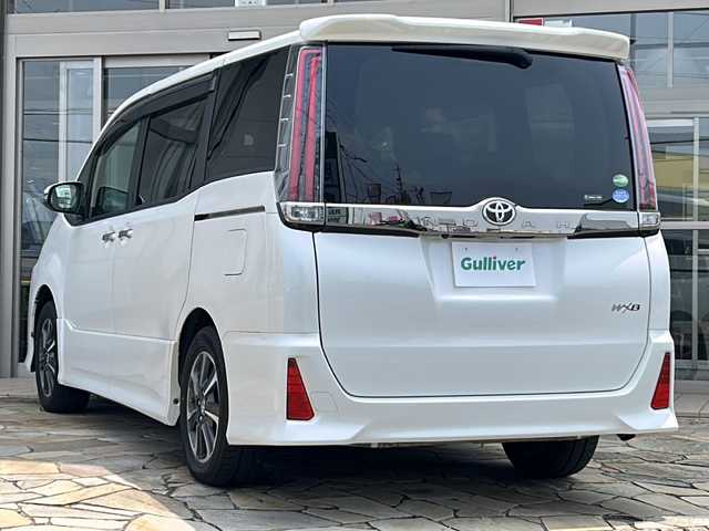 トヨタ ノア Si ダブルバイビー 静岡県 2018(平30)年 7.5万km ホワイトパールクリスタルシャイン ワンオーナー/純正10インチSDナビ/・CD/・DVD/・フルセグTV/・Bluetooth/・AM/・FM/主要装備/・純正フリップダウンモニター/・両側パワスラ/・衝突軽減/・レーンキープ/・クルコン/・バックカメラ/・ETC/・LEDオートライト/・オートハイビーム/・純正フロアマット/・純正アルミホイール/・スマートキー/・プッシュスタート