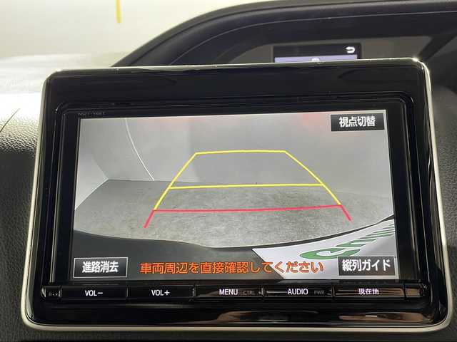 トヨタ ヴォクシー ハイブリッド V 沖縄県 2017(平29)年 6.7万km ブラック 禁煙車/県外仕入れ/9インチ純正ナビ/【CD/DVD/フルセグTV/BT】/12インチ純正フリップダウンモニター/バックカメラ/ドラレコ/ETC/片側パワースライドドア/前席シートヒーター/トヨタセーフティセンス/→衝突被害軽減システム/→レーンディパーチャーアラート/→オートマチックハイビーム/LEDヘッドライト/オートライト/スマートキー
