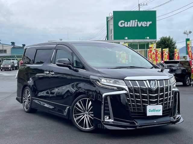 トヨタ アルファード S Cパッケージ 静岡県 2021(令3)年 0.5万km ブラック ●純正ナビ/(フルセグ/Bluetooth)/●TRDフルエアロ/●12.1インチフリップダウンモニター/●バックカメラ/●レーダークルーズコントロール/●プリクラッシュセーフティー/●レーントレーシングアシスト/●後方クリアランスソナー/●パーキングサポートブレーキ/●オートブレーキホールド/●LEDヘッドライト/●オートライト/●オートマチックハイビーム/●ウッドコンビステアリング/●ステアリングスイッチ/●ステアリングヒーター/●ETC2.0/●運転席シートメモリー/●運転席＆助手席パワーシート/●運転席＆助手席エアシート/●T’Zレーダー探知機/●前方ドライブレコーダー/●純正フロアマット/●ドアバイザー/●電動格納ウインカーミラー/●プッシュスタート/●スマートキー/●社外20インチアルミホイール/●W+サイド+カーテンSRS+ABS
