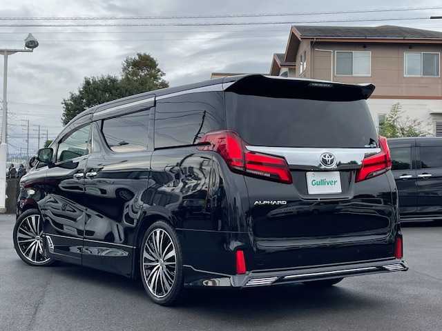 トヨタ アルファード S Cパッケージ 静岡県 2021(令3)年 0.5万km ブラック ●純正ナビ/(フルセグ/Bluetooth)/●TRDフルエアロ/●12.1インチフリップダウンモニター/●バックカメラ/●レーダークルーズコントロール/●プリクラッシュセーフティー/●レーントレーシングアシスト/●後方クリアランスソナー/●パーキングサポートブレーキ/●オートブレーキホールド/●LEDヘッドライト/●オートライト/●オートマチックハイビーム/●ウッドコンビステアリング/●ステアリングスイッチ/●ステアリングヒーター/●ETC2.0/●運転席シートメモリー/●運転席＆助手席パワーシート/●運転席＆助手席エアシート/●T’Zレーダー探知機/●前方ドライブレコーダー/●純正フロアマット/●ドアバイザー/●電動格納ウインカーミラー/●プッシュスタート/●スマートキー/●社外20インチアルミホイール/●W+サイド+カーテンSRS+ABS