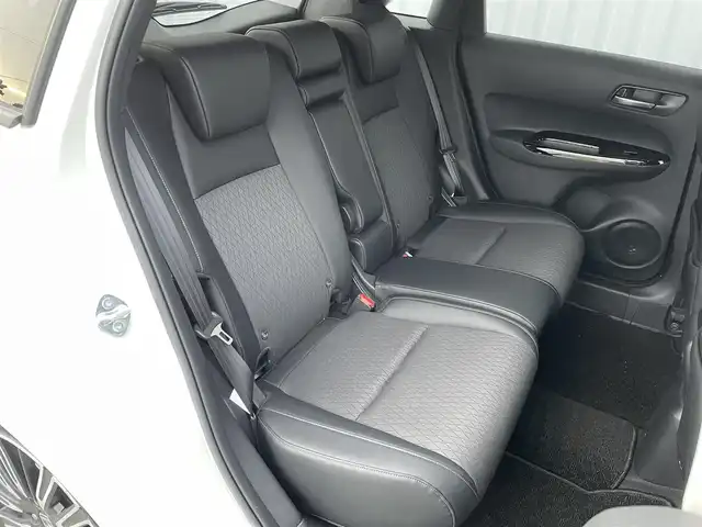 ホンダ フィット e:HEVリュクス 福岡県 2021(令3)年 1.5万km プラチナホワイトパール ホンダセンシング　/社外ナビ　/フルセグＴＶ　/Ｂｌｕｅｔｏｏｔｈ　/オートライト　/ＬＥＤライト／フォグランプ　/前席シートヒーター　/パーキングセンサー　/レザーシート　/革巻きステアリング　/ＡＣＣ　/車線逸脱防止/電動パーキング/ブレーキホールド/ビルドインETC/スマートキー/プッシュスタート/純正アルミホイール/ドアバイザー/ドライブレコーダー