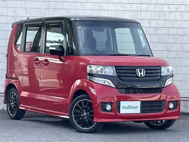 ホンダ Ｎ ＢＯＸ 2トーン カスタム G ターボAパッケージ 大分県 2014(平26)年 9.6万km ミラノレッド ターボ/社外メモリナビ MDV-Z701/【フルセグ/DVD/BTオーディオ】/両側パワースライドドア/純正15インチアルミホイール/シティブレーキアクティブシステム/クルーズコントロール/ETC/HIDヘッドライト/フォグランプ/オートライト/レザーステアリング/ステアリングリモコン/チルトステアリング/運転席シートリフター/ウインカーミラー/横滑り防止装置/エンジンプッシュスタート/リアプライバシーガラス/ドアバイザー/フロアマット/電動格納ミラー/サイド&カーテン&Wエアバッグ/ABS/スマートキー×2/車両取説/ナビ取説