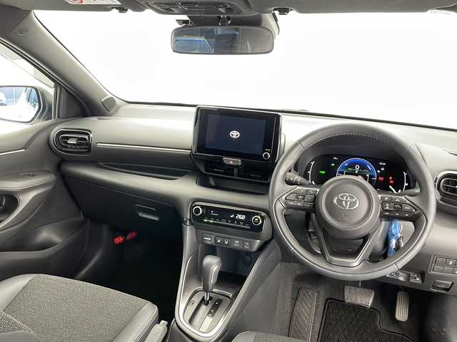 トヨタ ヤリス ハイブリッド Z 長野県 2024(令6)年 0.5万km スーパーホワイトⅡ 純正メモリナビ/Bluetooth／AM／FM/全方位カメラ/ETC/横滑り防止装置/衝突被害軽減システム/レーンキープアシスト/自動駐車システム/社外15インチAW装着/純正フロアマット/ドアバイザー/ヘッドライトレベライザー/クルーズコントロール/ハーフレザー/前席シートヒーター/前後コーナーセンサー/電格ミラー/LEDヘッドライト/スマートキー/スペアキー1本