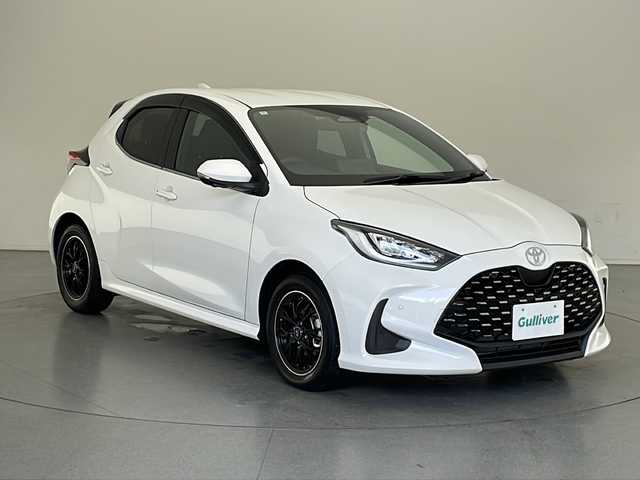 トヨタ ヤリス ハイブリッド Z 長野県 2024(令6)年 0.5万km スーパーホワイトⅡ 純正メモリナビ/Bluetooth／AM／FM/全方位カメラ/ETC/横滑り防止装置/衝突被害軽減システム/レーンキープアシスト/自動駐車システム/社外15インチAW装着/純正フロアマット/ドアバイザー/ヘッドライトレベライザー/クルーズコントロール/ハーフレザー/前席シートヒーター/前後コーナーセンサー/電格ミラー/LEDヘッドライト/スマートキー/スペアキー1本