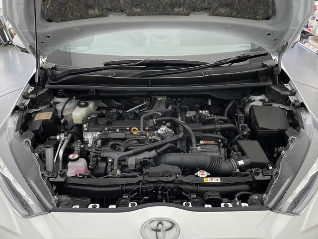 トヨタ ヤリス ハイブリッド Z 長野県 2024(令6)年 0.5万km スーパーホワイトⅡ 純正メモリナビ/Bluetooth／AM／FM/全方位カメラ/ETC/横滑り防止装置/衝突被害軽減システム/レーンキープアシスト/自動駐車システム/社外15インチAW装着/純正フロアマット/ドアバイザー/ヘッドライトレベライザー/クルーズコントロール/ハーフレザー/前席シートヒーター/前後コーナーセンサー/電格ミラー/LEDヘッドライト/スマートキー/スペアキー1本