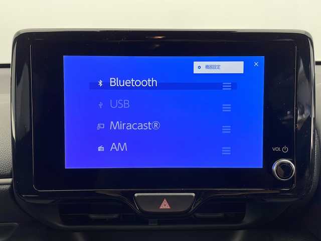 トヨタ ヤリス ハイブリッド Z 長野県 2024(令6)年 0.5万km スーパーホワイトⅡ 純正メモリナビ/Bluetooth／AM／FM/全方位カメラ/ETC/横滑り防止装置/衝突被害軽減システム/レーンキープアシスト/自動駐車システム/社外15インチAW装着/純正フロアマット/ドアバイザー/ヘッドライトレベライザー/クルーズコントロール/ハーフレザー/前席シートヒーター/前後コーナーセンサー/電格ミラー/LEDヘッドライト/スマートキー/スペアキー1本