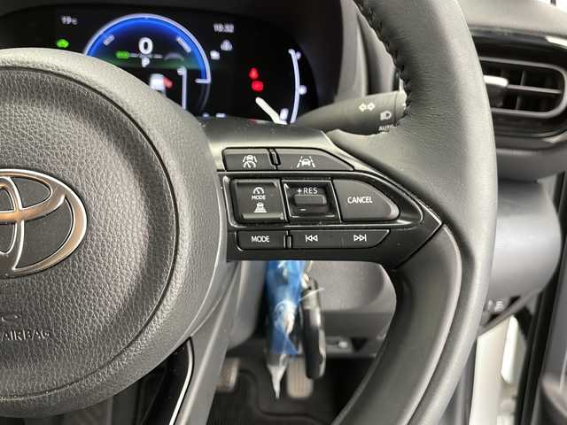 トヨタ ヤリス ハイブリッド Z 長野県 2024(令6)年 0.5万km スーパーホワイトⅡ 純正メモリナビ/Bluetooth／AM／FM/全方位カメラ/ETC/横滑り防止装置/衝突被害軽減システム/レーンキープアシスト/自動駐車システム/社外15インチAW装着/純正フロアマット/ドアバイザー/ヘッドライトレベライザー/クルーズコントロール/ハーフレザー/前席シートヒーター/前後コーナーセンサー/電格ミラー/LEDヘッドライト/スマートキー/スペアキー1本