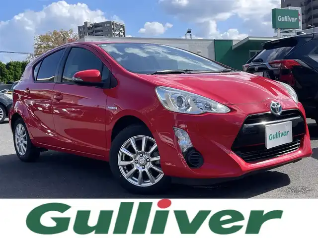 トヨタ アクア S 島根県 2016(平28)年 12.3万km スーパーレッドⅤ 純正SDナビ　/フルセグTV　/ＤＶＤ再生　/Ｂｌｕｅｔｏｏｔｈ　/バックカメラ　/前後ドラレコ　/ビルトインＥＴＣ　/スマートキー　/プッシュスタート　/社外１５インチアルミ　/オートライト　/オートエアコン/横滑り防止装置