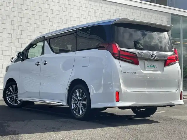 トヨタ アルファード S タイプゴールドⅡ 道央・札幌 2021(令3)年 5万km ホワイトパールクリスタルシャイン ・4WD/・寒冷地仕様/・純正ディスプレイオーディオ/（フルセグ/AM/FM/CD/DVD/BT）/・純正フリップダウンモニター/・純正エンジンスターター/・社外ドライブレコーダー前後/・純正ビルトインETC/・バックモニター/・デジタルインナーミラー/・両側パワースライドドア/・衝突軽減ブレーキ/・クルーズコントロール（追従機能付）/・コーナーセンサー/・レーンキープアシスト/・ハーフレザーシート/・オートエアコン/・純正　18インチAW（スタッドレス）/・電動バックドア/・後席オットマン/・ドアバイザー/・ステアリングスイッチ/・オートブレーキホールド/・電動パーキングブレーキ/・LEDヘッドライト/・LEDフォグランプ/・リアフォグランプ/・ワイパーデアイサー/・オートライト/・オートハイビーム/・SOSコール/・盗難防止装置/・ABS/・横滑り防止装置/・スマートキー/・プッシュスタート/・スペアキー/・社外フロアマット