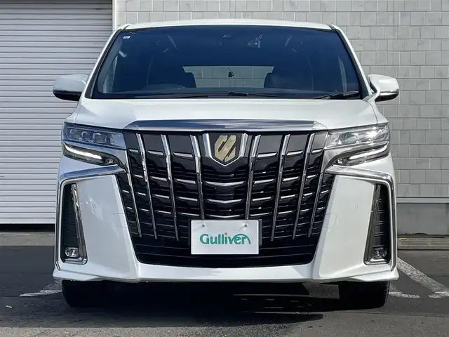 トヨタ アルファード S タイプゴールドⅡ 道央・札幌 2021(令3)年 5万km ホワイトパールクリスタルシャイン ・4WD/・寒冷地仕様/・純正ディスプレイオーディオ/（フルセグ/AM/FM/CD/DVD/BT）/・純正フリップダウンモニター/・純正エンジンスターター/・社外ドライブレコーダー前後/・純正ビルトインETC/・バックモニター/・デジタルインナーミラー/・両側パワースライドドア/・衝突軽減ブレーキ/・クルーズコントロール（追従機能付）/・コーナーセンサー/・レーンキープアシスト/・ハーフレザーシート/・オートエアコン/・純正　18インチAW（スタッドレス）/・電動バックドア/・後席オットマン/・ドアバイザー/・ステアリングスイッチ/・オートブレーキホールド/・電動パーキングブレーキ/・LEDヘッドライト/・LEDフォグランプ/・リアフォグランプ/・ワイパーデアイサー/・オートライト/・オートハイビーム/・SOSコール/・盗難防止装置/・ABS/・横滑り防止装置/・スマートキー/・プッシュスタート/・スペアキー/・社外フロアマット