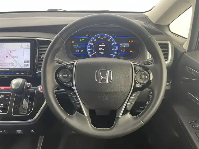 ホンダ オデッセイ ハイブリッド アブソルート・EXホンダセンジング 埼玉県 2017(平29)年 4.3万km プレミアムヴィーナスブラックP ホンダセンシング/　CMBS（衝突軽減ブレーキ）/　ACC（アダプティブクルーズコントロール）/　LKAS（車線維持支援システム）/純正9インチメモリナビ　（VXM-185VFNi）/　DTV CD DVD BT USB HDMI iPod/両側パワースライドドア/全方位カメラ/純正フリップダウンモニター/後席スモーク/ウォークスルー/横滑り防止装置/ビルトインETC2.0/エンジンスタートボタン/スマートキー/スペアキー/オートライト/純正LEDヘッドライト＆フォグランプ/純正アルミホイール