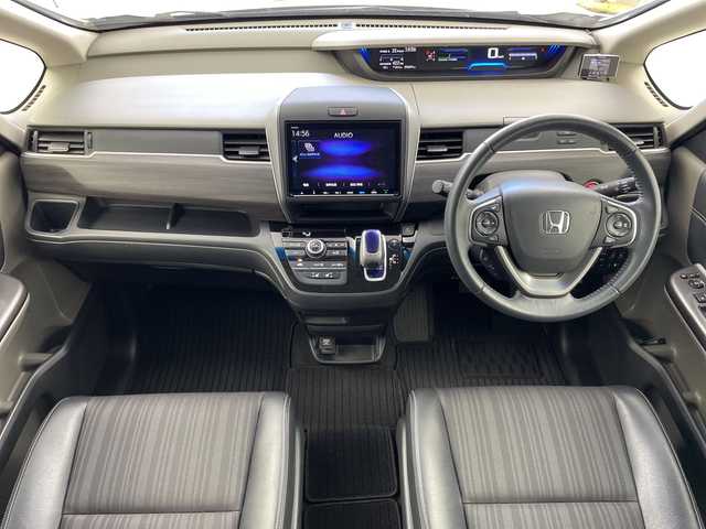 ホンダ フリード ハイブリット EX 岐阜県 2018(平30)年 5.6万km ホワイトオーキッドパール 純正9インチメモリナビ（VXM-197VFNi）/フルセグ/BT/DVD/バックカメラ/ホンダセンシング/・衝突軽減ブレーキ/・アダプティブクルーズコントロール/・車線維持支援システム/・路外逸脱抑制機能/・先行車発進お知らせ機能/・誤発進抑制機能/・後方誤発進抑制機能/ビルトインETC/社外ドライブ/ハーフレザーシート/前席シートヒーター/本革ステアリング/ステアリングスイッチ/LEDオートライト/パーキングセンサー/純正フロアマット/GPSレーダー探知機/サイドバイザー/純正15インチAW/プッシュスタート/サンシェード