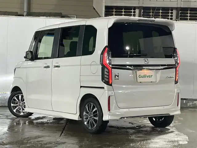 ホンダ Ｎ ＢＯＸ カスタム L 青森県 2023(令5)年 0.8万km プラチナホワイトパール ワンオーナー/純正14AW/純正フロアマット/両側パワースライドドア/フォグランプ/コーナーセンサー/ベンチシート/シートヒーター前席/クルーズコントロール/衝突軽減ブレーキ/車線逸脱警報/アイドリングストップ/ヒルスタートアシスト/盗難防止警報/横滑り防止機能/電動パーキング/USB/スペアキー/社外14AW冬タイヤ積込（155/65/14）/保証書/取扱説明書