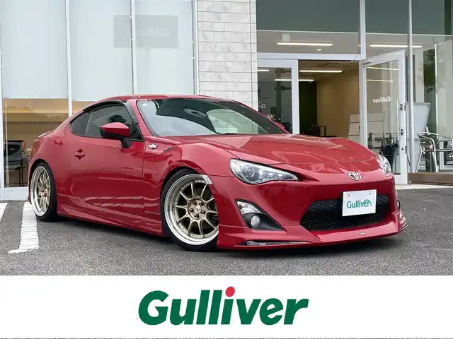 トヨタ ８６ GT 宮崎県 2014(平26)年 5.6万km ライトニングレッド 純正SDナビ(NSZT-W62G)/フルセグTV/バックカメラ/パドルシフト/スマートキー/ETC/電動リアゲート/ベンチシート/純正フロアマット/モデリスタエアロパーツ/社外18インチアルミホイール/横滑り防止装置/盗難防止装置/オートライト/ダブル＋サイドエアバック