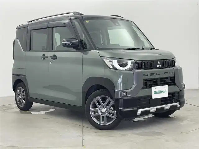 三菱 デリカミニ T プレミアム 富山県 2023(令5)年 0.5万km ＤグリーンⅡ 4WD/社外ナビ（AM/FM/CD/DVD/SD/BT）/フルセグTV/アラウンドビューモニター/衝突被害軽減ブレーキシステム/マイパイロット/アダプティブクルーズコントロール/車線逸脱防止支援機能/オートマチックハイビーム/LEDヘッドライト/ハーフレザーシート/前席シートヒーター/ステアリングヒーター/デジタルインナーミラー/パドルシフト/コーナーセンサー前後/ダウンヒルアシストコントロール/純正15インチAW/スマートキー×２/プッシュスタート/取扱説明書/保証書/社外フロアマット