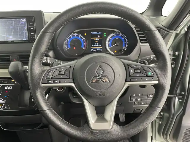 三菱 デリカミニ T プレミアム 富山県 2023(令5)年 0.5万km ＤグリーンⅡ 4WD/社外ナビ（AM/FM/CD/DVD/SD/BT）/フルセグTV/アラウンドビューモニター/衝突被害軽減ブレーキシステム/マイパイロット/アダプティブクルーズコントロール/車線逸脱防止支援機能/オートマチックハイビーム/LEDヘッドライト/ハーフレザーシート/前席シートヒーター/ステアリングヒーター/デジタルインナーミラー/パドルシフト/コーナーセンサー前後/ダウンヒルアシストコントロール/純正15インチAW/スマートキー×２/プッシュスタート/取扱説明書/保証書/社外フロアマット