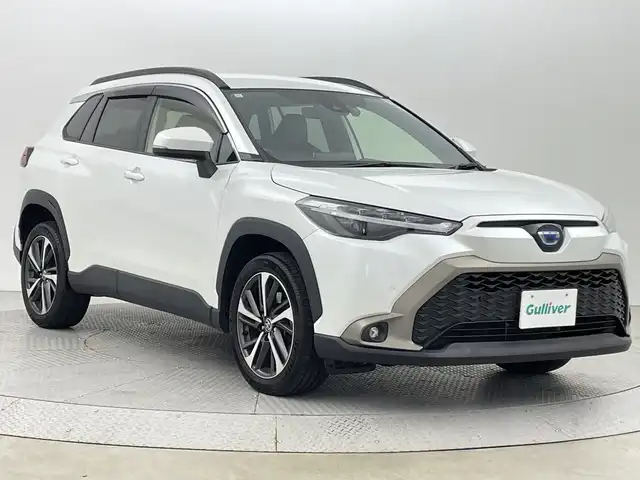 トヨタ カローラ クロス ハイブリッド Z 新潟県 2021(令3)年 5.2万km プラチナホワイトパールマイカ 禁煙車/ワンオーナー/純正ディスプレイオーディオ/　フルセグ/USB/Bluetooth/Miracast/　ナビ無料期間終了/バックカメラ/コーナーセンサー/ハーフレザーシート/前席シートヒーター/運転席パワーシート/パワーバックドア/LEDヘッドライト/オートライト/フォグランプ/オートハイビーム/レーダークルーズコントロール/電動格納式ミラー/ETC/社外ルミ付きスタッドレス/　（積み込み８mm）/新車時保証書/取扱説明書/スペアキー