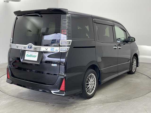 トヨタ ヴォクシー ハイブリッド ZS 煌Ⅲ 兵庫県 2021(令3)年 1.8万km ブラック [簡単登録・DNクレーム無効]/・純正メモリナビ/AM/FM/CD/DVD/USB/SD/・フルセグTV/・Bluetooth接続/・アップルカープレイ/・クルーズコントロール/・バックカメラ/・前席シートヒーター/・前後ドライブレコーダー/・ビルトインETC/・両側パワースライドドア/・レーンキープアシスト/・衝突被害軽減システム/・横滑り防止装置/・コーナーセンサー/・LEDヘッドライト/・フロアマット/・16インチ純正アルミホイール/・
