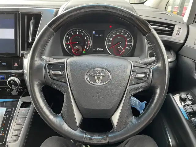 トヨタ ヴェルファイア Z Gエディション 千葉県 2019(令1)年 3.8万km ブラック 純正10インチナビ/(BT/AM/FM/CD/DVD/フルセグTV)/バックカメラ/純正フリップダウンモニター/サンルーフ/衝突被害軽減システム/車線逸脱警報/クルーズコントロール/レザーシート/両側パワースライドドア/横滑り防止装置/ETC/ドライブレコーダー/LEDヘッドライト/フォグランプ/オートライト/ウィンカーミラー/電動格納ミラー/純正18インチAW/シートヒーター/エアシート/シートリフター/ステアリングヒーター/プッシュスタート/スマートキー/フロアマット/ドアバイザー/スペアキー/取扱説明書/保証書