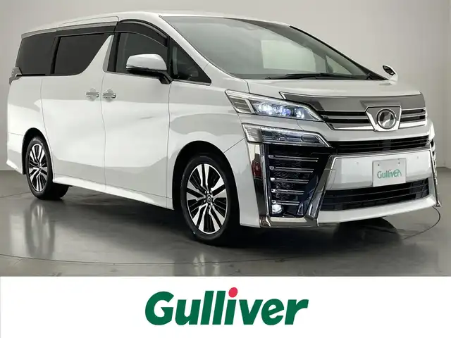 トヨタ ヴェルファイア Z Gエディション 愛知県 2018(平30)年 2.3万km ホワイトパールクリスタルシャイン 純正１０型ナビ　純正後席モニター　禁煙車　バックカメラ　三眼ＬＥＤライト　ＡＣ１００Ｖ電源　黒革　シートヒーター　エアシート　電動リアゲート　両側パワスラ　セーフティセンス　衝突軽減装置　追従クルコン