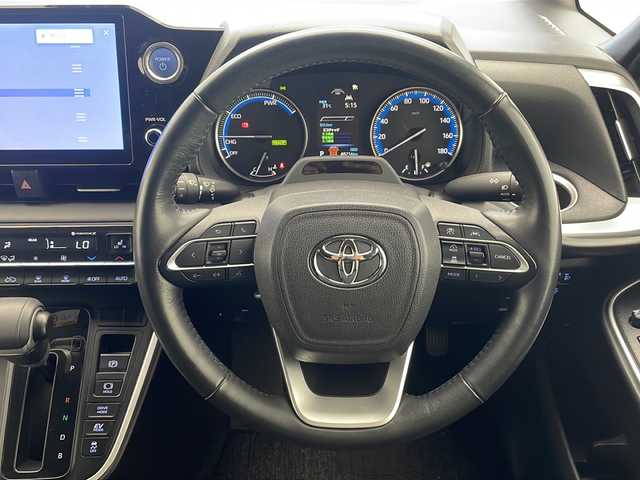 トヨタ ヴォクシー ハイブリッド S－G 沖縄県 2022(令4)年 4.9万km グリッターブラックガラスフレーク 純正10.5インチディスプレイオーディオ　/（フルセグＴＶ　DVD　Ｂｌｕｅｔｏｏｔｈ接続　HDMI）/バックカメラ/ＥＴＣ/両側パワースライドドア/トヨタセーフティセンス/・衝突被害軽減ブレーキ (プリクラッシュセーフティ)																									/・ハンドル操作サポート (レーントレーシングアシスト)																									/・追従ドライブ支援機能 (レーダークルーズコントロール)																									/・車線はみ出しアラート (レーンディパーチャーアラート)																									/・自動ハイビーム (オートマチックハイビーム)																									/ステアリングスイッチ/シートヒーター/クリアランスソナー/ＢＳＭ/ＬＥＤヘッドライト/オートライト/スマートキー/プッシュスタート/保証書/取扱説明書