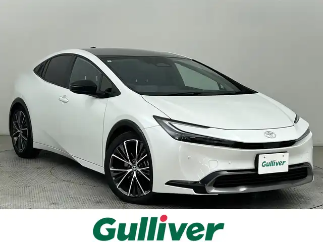 トヨタ プリウス Z 道央・札幌 2023(令5)年 0.4万km プラチナホワイトパールマイカ ・４WD/・寒冷地仕様/・パノラマルーフ/・12型ディスプレイオーディオ/・パノラミックビューモニター/・デジタルインナーミラー/・ワイヤレス充電/・ビルトインETC2.0/・トヨタセーフティセンス/・レーダークルーズコントロール/・オートハイビーム/・PCS/・PDA/・RCTA/・RCD/・PKSB/・RSA/・BSM/・パーキングアシスト/・レザーシート/・D席パワーシート/・前席シートヒーター/・前席シートベンチレーション/・パワーバックドア/・LEDヘッドライト/・フォグライト/・オートライト/・純正フロアマット