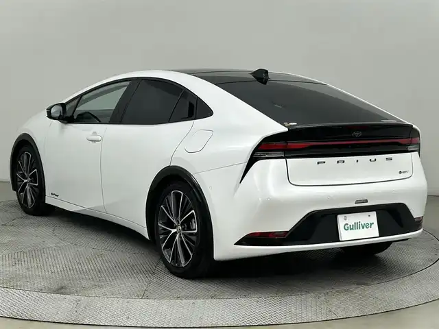 トヨタ プリウス Z 道央・札幌 2023(令5)年 0.4万km プラチナホワイトパールマイカ ・４WD/・寒冷地仕様/・パノラマルーフ/・12型ディスプレイオーディオ/・パノラミックビューモニター/・デジタルインナーミラー/・ワイヤレス充電/・ビルトインETC2.0/・トヨタセーフティセンス/・レーダークルーズコントロール/・オートハイビーム/・PCS/・PDA/・RCTA/・RCD/・PKSB/・RSA/・BSM/・パーキングアシスト/・レザーシート/・D席パワーシート/・前席シートヒーター/・前席シートベンチレーション/・パワーバックドア/・LEDヘッドライト/・フォグライト/・オートライト/・純正フロアマット