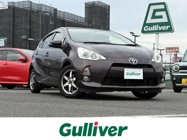 トヨタ アクア G 大分県 2014(平26)年 5万km ディープアメジストマイカメタリック ・ナビ(CD/BT/SD)/・バックカメラ/・ワンセグテレビ/・ETC/・ステアリングリモコン/・電格ミラー/・スマートキー/・プッシュスタートボタン/・フロアマット/・社外ホイール