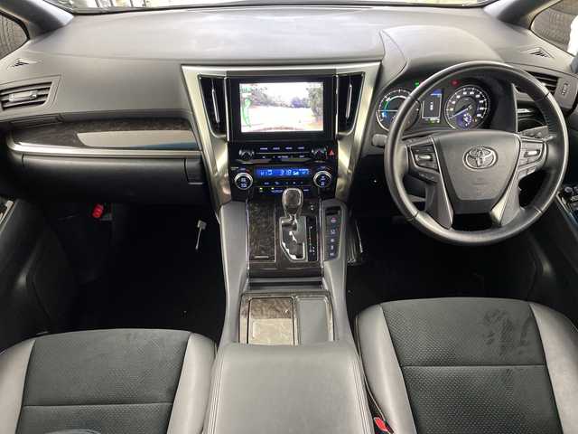 トヨタ アルファードハイブリット S タイプゴールドⅡ 道央・札幌 2022(令4)年 2.9万km ブラック ・４ＷＤ　/・ツインムーンルーフ　/・トヨタセーフティーセンス　/・純正９インチディスプレイオーディオ/・ナビ/BT/CD/DVD/USB/フルセグ/・TV/AppleCarPlay/AndroidAuto）　/・バックカメラ　/・純正フリップダウンモニター　/・両側パワースライドドア　/・パワーバックドア　/・ハーフレザーシート/運転席パワーシート/・オットマンシート/・ステアリングスイッチ/・LEDヘッドライト/オートライト/・オートマチックハイビーム/・プッシュスタート/スマートキー/・ETC/電動格納ミラー/・MTモード付AT/・純正ドライブレコーダー/・AC100W/1500W