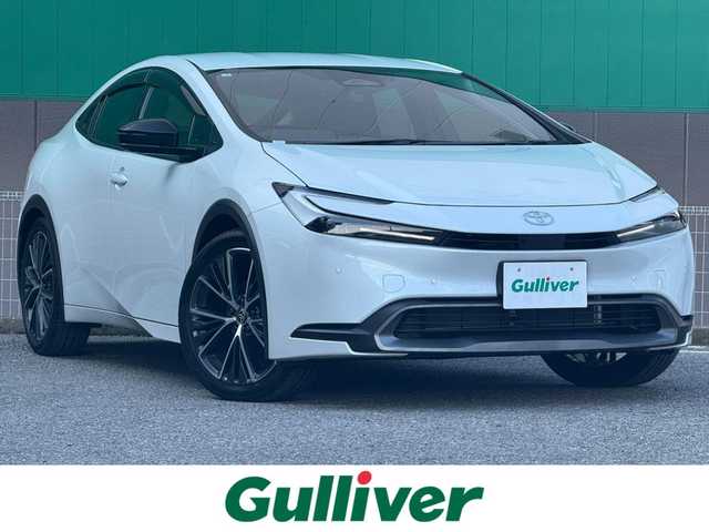 トヨタ プリウス G 千葉県 2025(令7)年 0.1千km プラチナホワイトパールマイカ ８インチディスプレイオーディオTV/トヨタセーフティセンス/パーキングサポートブレーキ/ブラインドスポットモニター/パノラミックビューモニター/ETC２．０/シートヒーターD席／N席/純正アルミ/オートハイビーム/AC１００V/レーダークルーズコントロール/ドアバイザー/ステアリングスイッチ