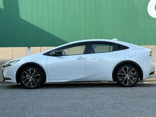 トヨタ プリウス G 千葉県 2025(令7)年 0.1千km プラチナホワイトパールマイカ ８インチディスプレイオーディオTV/トヨタセーフティセンス/パーキングサポートブレーキ/ブラインドスポットモニター/パノラミックビューモニター/ETC２．０/シートヒーターD席／N席/純正アルミ/オートハイビーム/AC１００V/レーダークルーズコントロール/ドアバイザー/ステアリングスイッチ