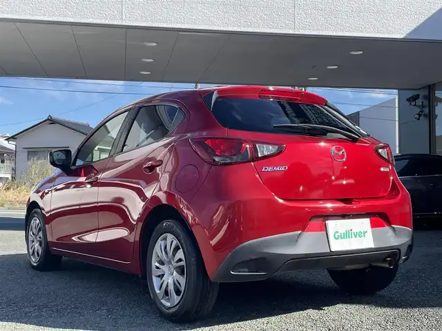 マツダ デミオ 13S 熊本県 2015(平27)年 9.5万km ソウルレッドプレミアムメタリック 純正ナビ/【ワンセグテレビ/Bluetooth/USB/AM/FM】/バックカメラ/ステアリングスイッチ/アイドリングストップ/横滑り防止/MTモード/プッシュスタート/HID/ヘッドライトレベライザー/スマートキー/スペアキー/ドアバイザー/取扱説明書