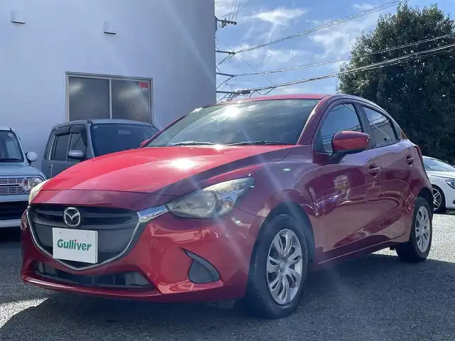 マツダ デミオ 13S 熊本県 2015(平27)年 9.5万km ソウルレッドプレミアムメタリック 純正ナビ/【ワンセグテレビ/Bluetooth/USB/AM/FM】/バックカメラ/ステアリングスイッチ/アイドリングストップ/横滑り防止/MTモード/プッシュスタート/HID/ヘッドライトレベライザー/スマートキー/スペアキー/ドアバイザー/取扱説明書