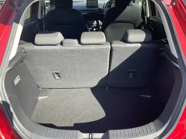 マツダ デミオ 13S 熊本県 2015(平27)年 9.5万km ソウルレッドプレミアムメタリック 純正ナビ/【ワンセグテレビ/Bluetooth/USB/AM/FM】/バックカメラ/ステアリングスイッチ/アイドリングストップ/横滑り防止/MTモード/プッシュスタート/HID/ヘッドライトレベライザー/スマートキー/スペアキー/ドアバイザー/取扱説明書