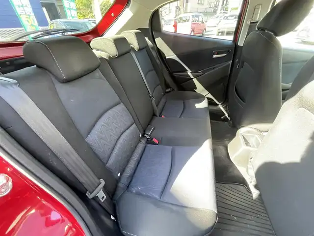 マツダ デミオ 13S 熊本県 2015(平27)年 9.5万km ソウルレッドプレミアムメタリック 純正ナビ/【ワンセグテレビ/Bluetooth/USB/AM/FM】/バックカメラ/ステアリングスイッチ/アイドリングストップ/横滑り防止/MTモード/プッシュスタート/HID/ヘッドライトレベライザー/スマートキー/スペアキー/ドアバイザー/取扱説明書